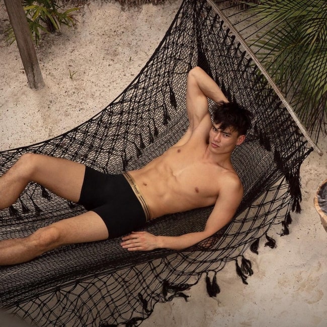 Simonas Pham as seen in a shirtless picture that was taken in Tulum, Mexico in February 2021